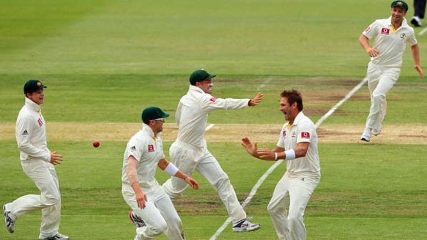 Ryan Harris celebrates the wicket of Steven Finn to sew up the third Test.