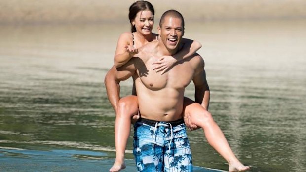 Lisa and Blake messing around on a Noosa beach near her 'family home'.