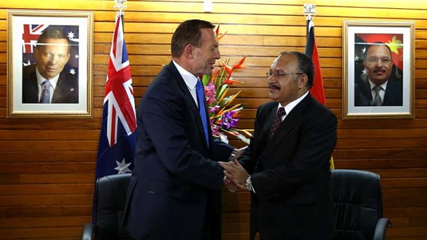 "It's a joint effort": Prime Minister Tony Abbott and PNG Prime Minister Peter O'Neill in Port Moresby.