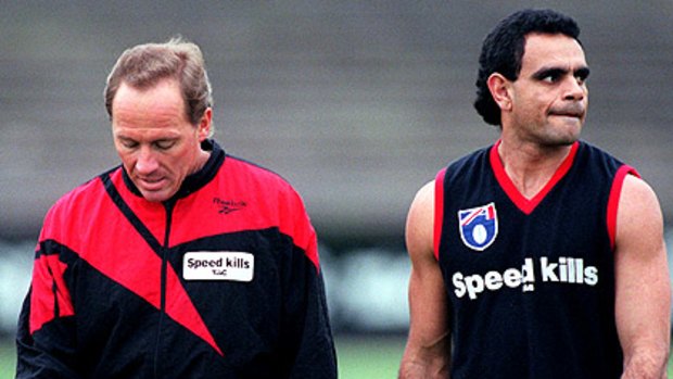 Danny Corcoran (left), then Essendon’s football manager, with club great Michael Long in 1995. Corcoran’s return has ruffled some feathers.