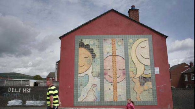 Pictorial messages of peace and hope on Northern Irish walls replace the more confronting images of the past. <i>Picture: Angela Catlin</i>