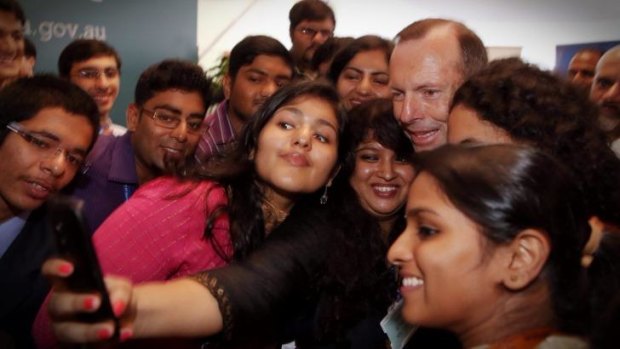 Prime Minister Tony Abbott mixes with students. 