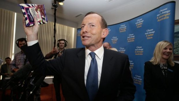 Tony Abbott, then opposition leader, at the Cadbury factory in Hobart during the 2013 election.