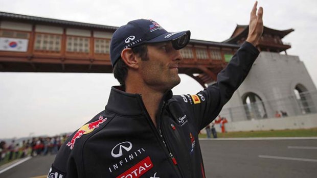Mark Webber acknowledges the crowd after the qualifying session.
