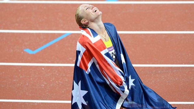 Everything she needs: Sally Pearson celebrates her win in the women's 100m hurdles at the London Olympics.