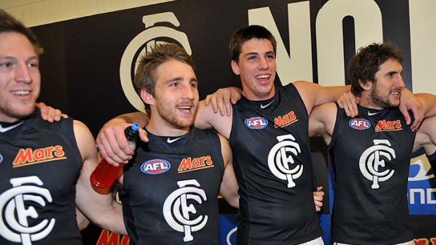 Blue boys: (Left to right) Jeremy Laidler, Zach Tuohy, Matthew Kreuzer and Jarrad Waite celebrate a win last year. Keeping injury free is crucial this year, says Lloyd.