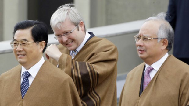 In the time of silly shirts: Australian Prime Minister Kevin Rudd (centre), Chinese President Hu Jintao (left) and Malaysian Deputy Prime Minister Najib Razak wear traditional Peruvian ponchos for the official group photograph at the conclusion of the Asian Pacific Economic Co-operation conference in Lima.