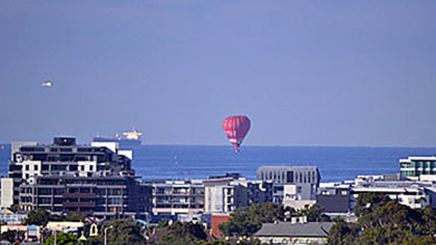The hot air ballon over Port Melbourne this morning.
