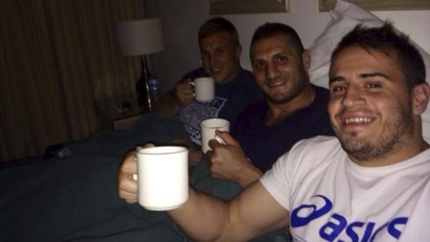 Josh Reynolds, Robbie Farah and Trent Hodkinson in their hotel room at Coffs Harbour.