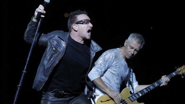 Bono and Adam Clayton perform in Moscow.