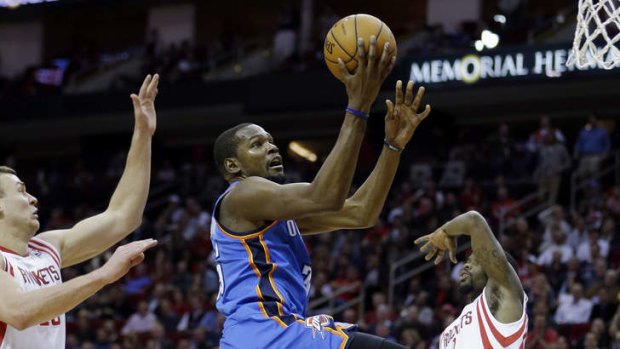 Oklahoma City Thunder's Kevin Durant drives to the hoop during his 54-point performance.