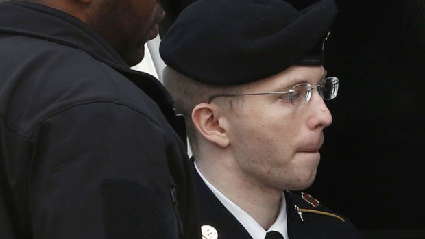 Bradley Manning is escorted into court in Fort Meade on Wednesday, where he was sentenced to 35 years in jail.
