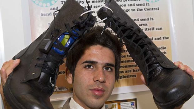 Iranian Payman Sarhadi presents his "super smart boots", which are equipped with sensors that detect the air temperature, humidity and the wearer's blood pressure.