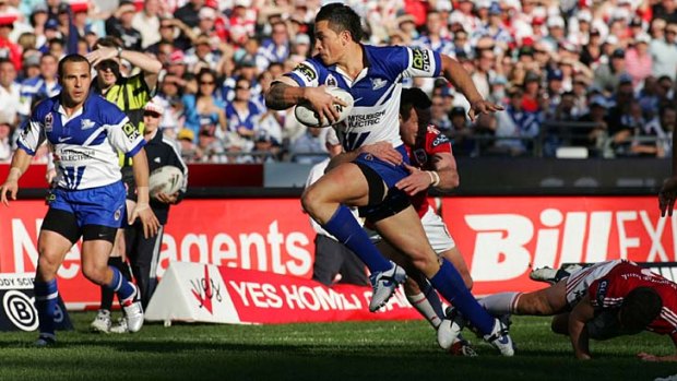 Happier days &#8230; Sonny Bill Williams sets up Hazem El Masri to score a try for the Bulldogs in a match against St George Illawarra in 2006. Williams walked out on the club two years later.