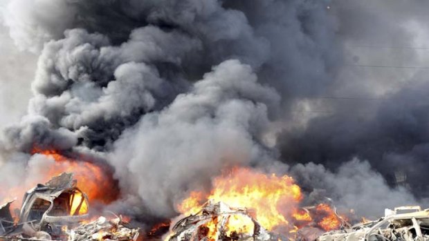 Deadly fireball ... at least 40 people, thought to be mostly civilians, were killed in two blasts in Damascus yesterday.