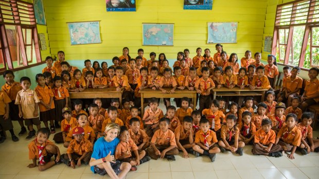 Winter Vincent with kids from Sarasau primary school, Siberut, Mentawai Islands.