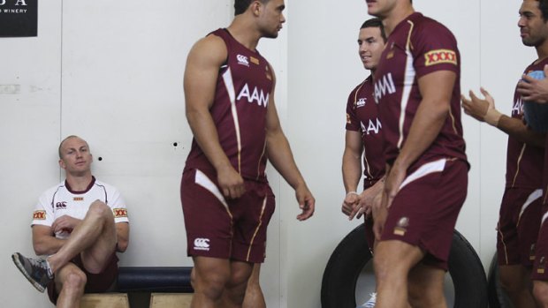 Rest and be thankful ... Darren Lockyer takes time out from a training session prior to Origin I.