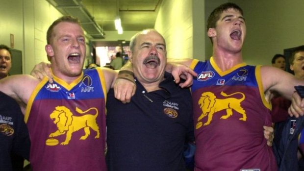 Michael Voss, Leigh Matthews and Jonathan Brown sing the song after a win.