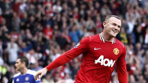 Hot run ... Wayne Rooney celebrates his goal against Chelsea.