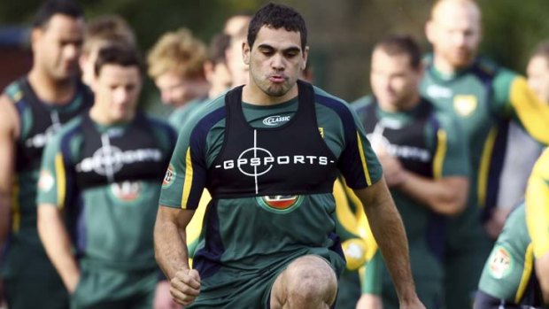 At work &#8230; Greg Inglis and the Kangaroos prepare for the England clash; flying high for the Rabbitohs.