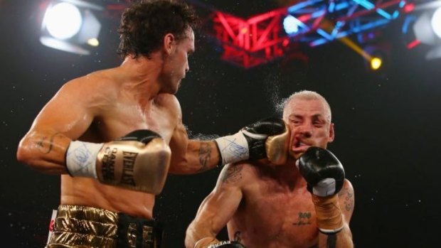 Daniel Geale punches Garth Wood during the I.B.F. Middleweight Pan Pacific title bout at the Hordern Pavilion in February.