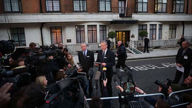 King Edward VII hospital chief executive John Lofthouse, right, and the hospital's chairman, Simon Glenarthur, address the media in London.