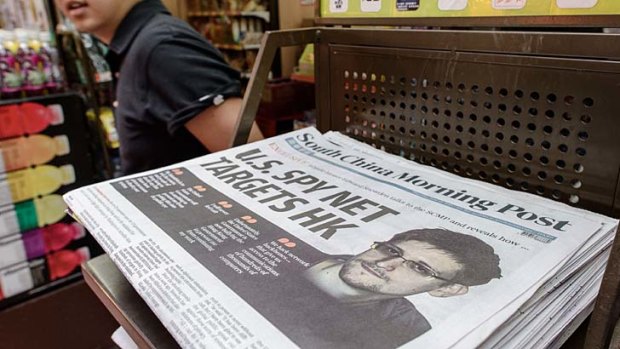 Page one: Hong Kong newspapers show leaker Edward Snowden.