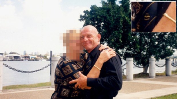 Convicted murderer Lee Owen Henderson is allowed out of jail to visit the Brett's Wharf restaurant in 2002. The CMC says this photo, found in Henderson's Townsville jail cell, shows he was wearing civilian clothing along with a tie bearing a motif used by police Armed Robbery Unit officers (inset).
