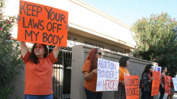 Outrage: Protesters outside the Whole Women's Health clinic in McAllen Texas.