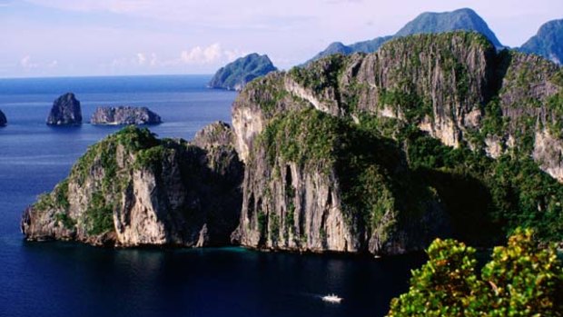 Limestone walls and the blue waters.