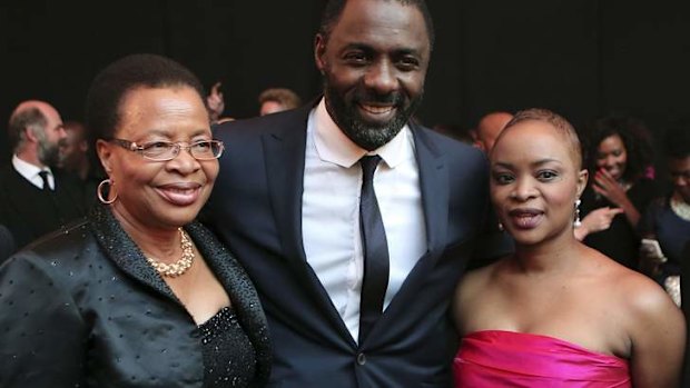 With Mandela's widow Graca Machel, left, and her daughter Jozina Machel at the premiere of <i>Mandela: Long Walk To Freedom</i> in Johannesburg last month.