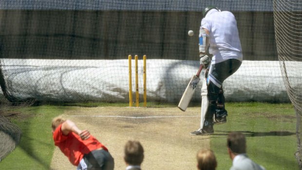 Under fire: Piers Morgan is struck by Brett Lee in the nets during day two of the Fourth Test at the MCG.