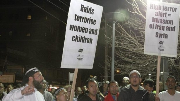 Fire up: Members of the Muslim community protest in Lakemba over terrorism raids.