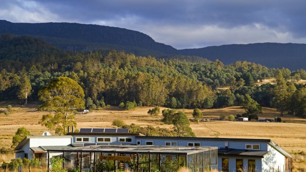 Forest Walks Lodge with the Great Western Tiers rising behind it.