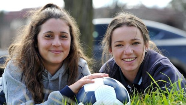 Grace Maher, 15, right, and Julia De Angelis, 16, are the two new additions to the Canberra United squad.