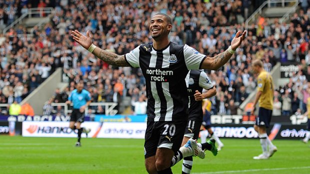 Leon Best of Newcastle United celebrates scoring the opening goal against Fulham.