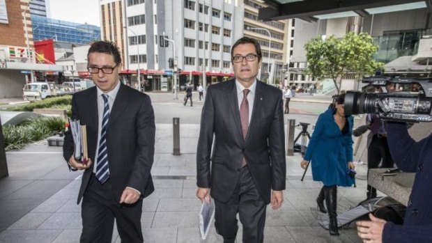 Former climate change minister Greg Combet arrives at the inquiry in Brisbane.