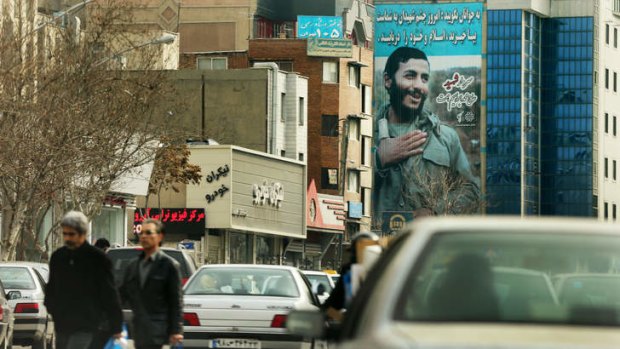 Tehran remembers its Iran-Iraq war "martyrs" on a city mural.