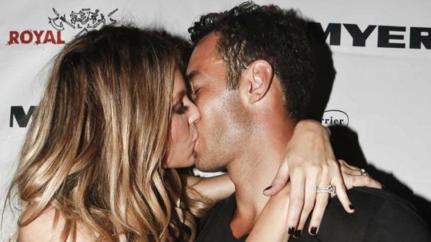 Face of Myer and queen bee of the Birdcage Jennifer Hawkins PDA-ing like she's in GA with her husband Jake Wall.