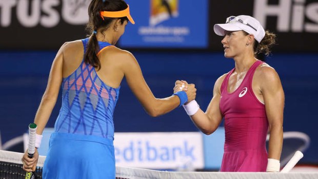 Tough night: Sam Stosur (right) congratulates Ana Ivanovic.