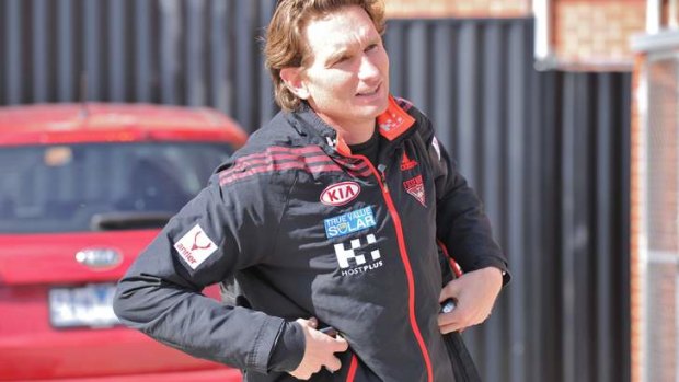 Day of destiny: Bombers coach James Hird runs the media gauntlet at Windy Hill on Tuesday.