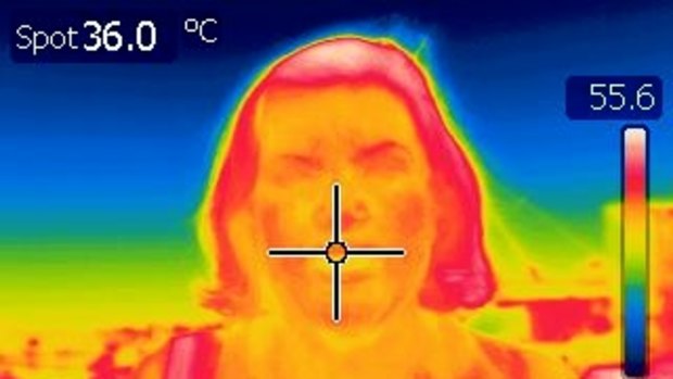 Reporter Catherine Armitage stays at a cool 36 degrees  on the infrared camera. 