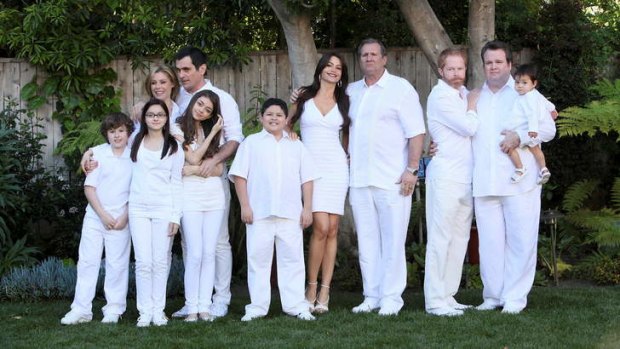 Booked their tickets for Australia ... The cast of American sitcom Modern Family, starring Jesse Tyler and Eric Stonestreet (far right).