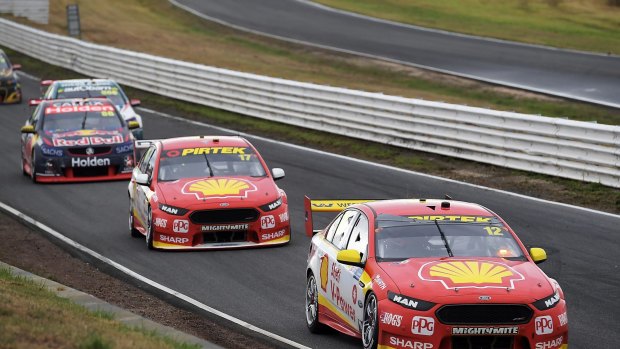 The Shell V-Power Racing Ford Falcons of New Zealanders Fabian Coulthard and Scott McLaughlin beat the Triple Eight Holden Commodores of Jamie Whincup and Craig Lowndes at Symmons Plains Raceway.