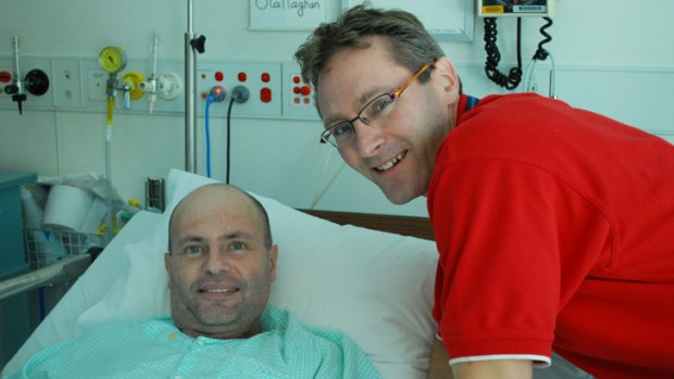Darryl O'Callaghan (left, pictured with trauma doctor Martin Wullshleger) leaves RBWH last October.