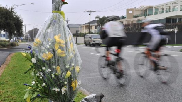 Flowers mark where a cyclist died on the weekend.