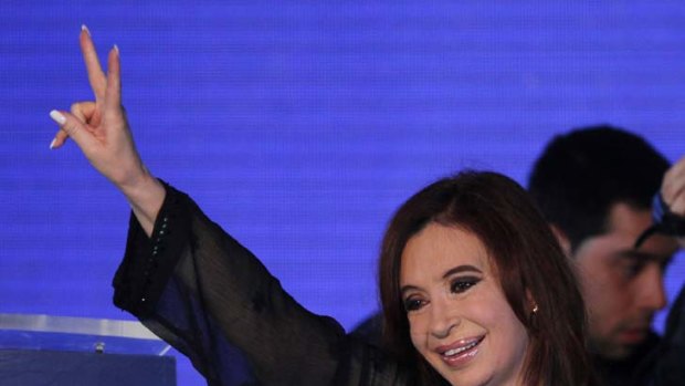 Victory ... Argentine President Cristina Fernandez de Kirchner celebrates her landslide win.