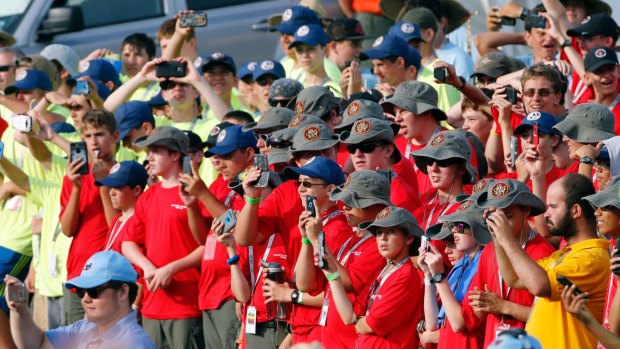 Scouts and their leaders listen to President Trump at the jamboree.