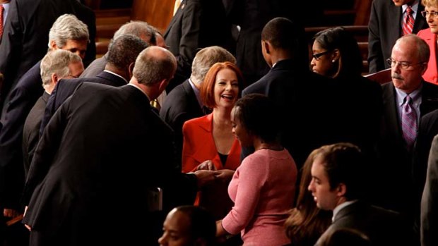 Australia Prime Minister Julia Gillard signs autographs after she addressed a Joint Meeting of Congress in Washington DC.