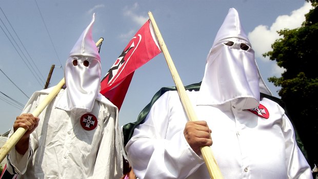 Members of the Ku Klux Klan march through the streets of Sharpsburg, Maryland, in 2004. 
